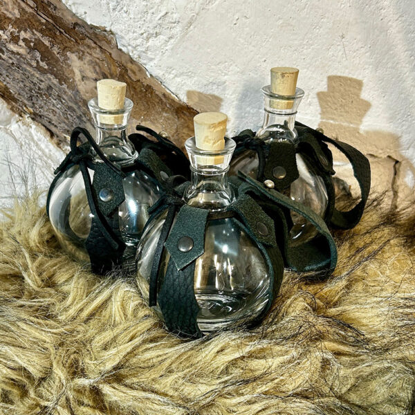 Glasflaska med bälteshållare